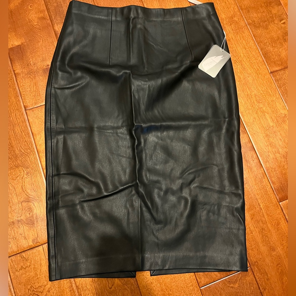 Just below the knee pleather skirt.